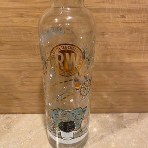 Boy looking thru map Glass Bottles